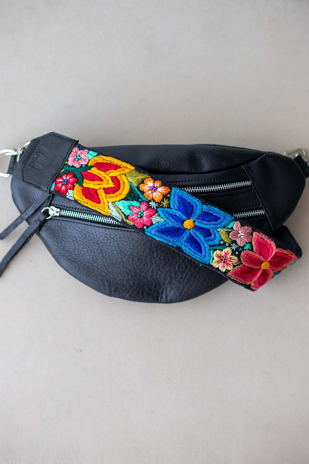 Hand Matters. Black leather sling bag with embroidered strap!