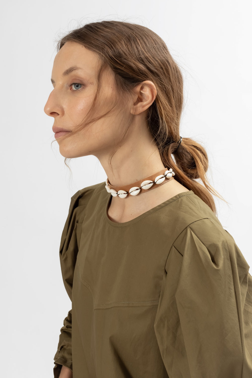 Hand Matters. Brown leather choker with snails.