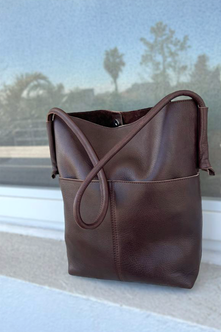 Hand matters compact leather bag