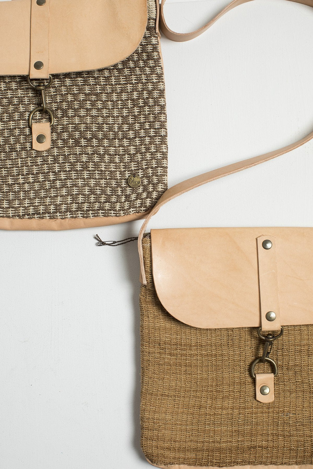 Hand Matters. Chaguar and leather small crossbody bags in brown and brick