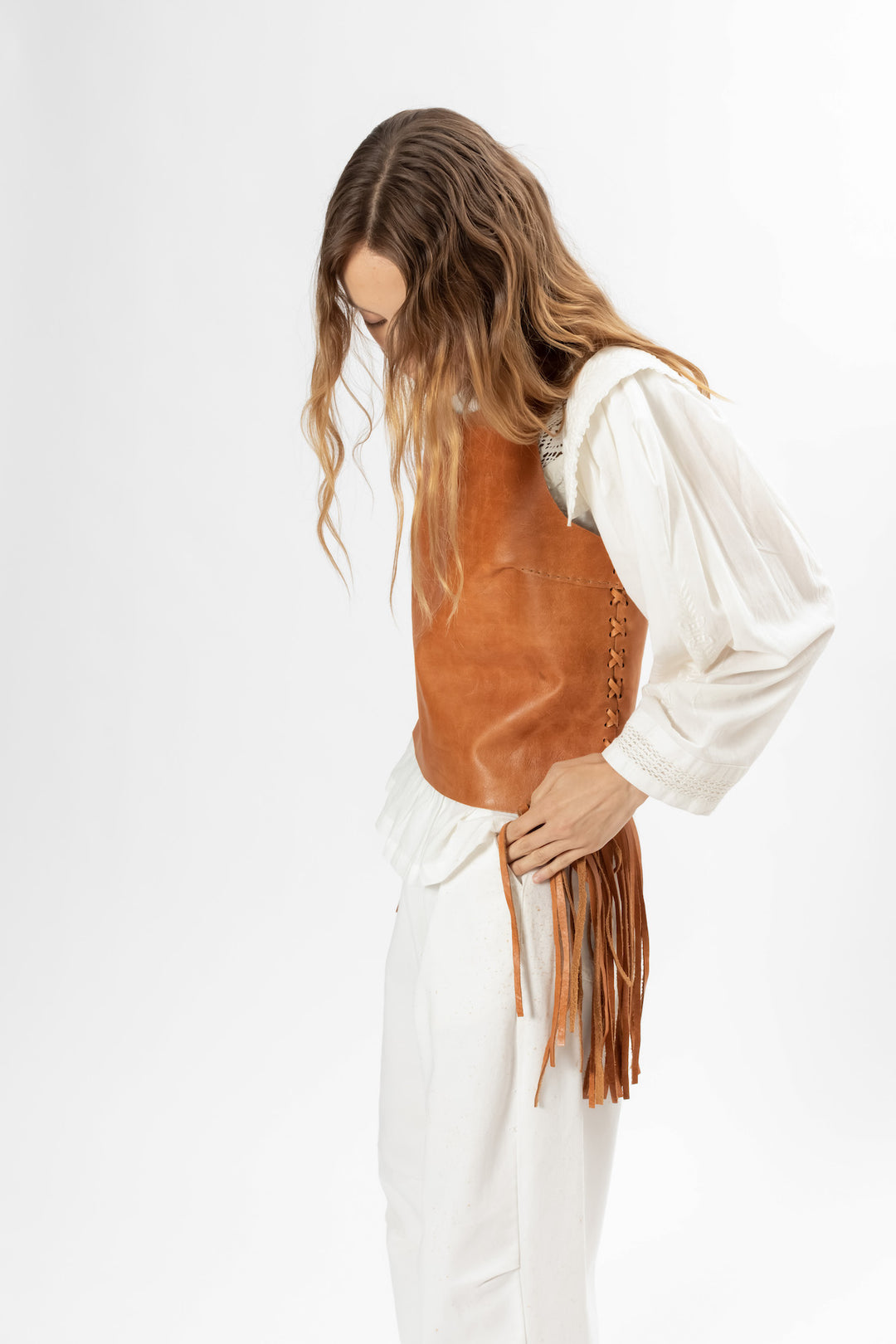 Chic Leather top with fringes. Hand Matters.