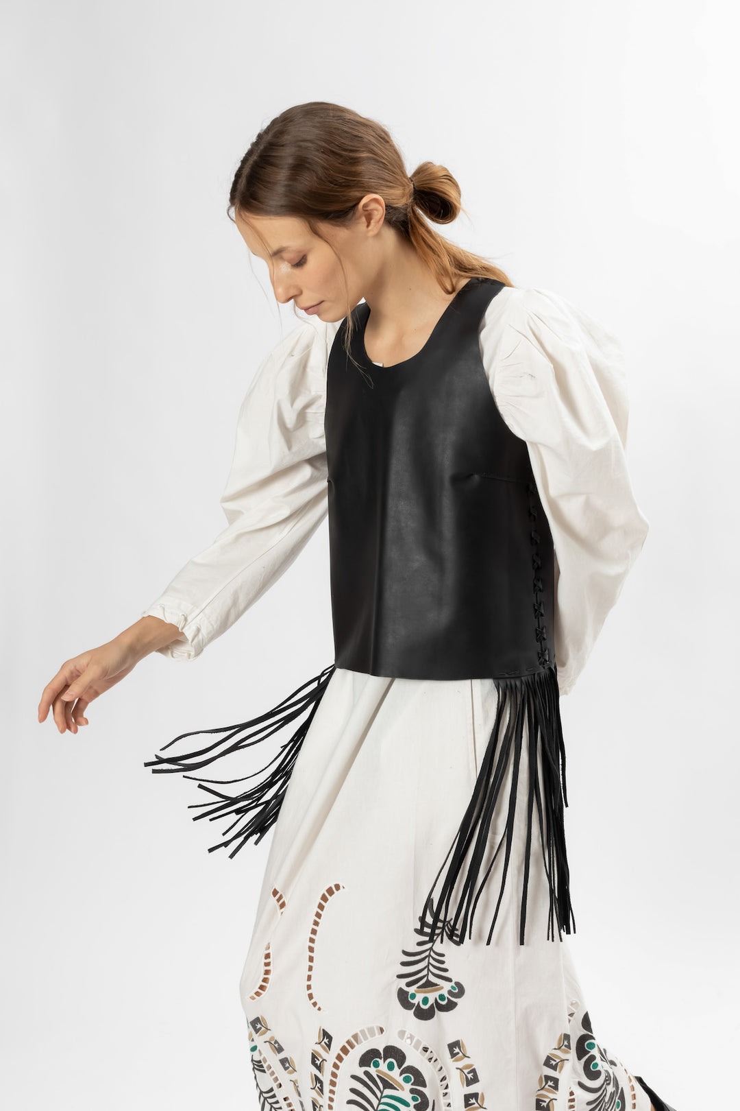 Hand Matters. Styling leather top with fringes